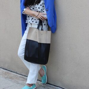 Soft, color-block Shopper Tote with concealed magnetic fastener at top. Unlined.